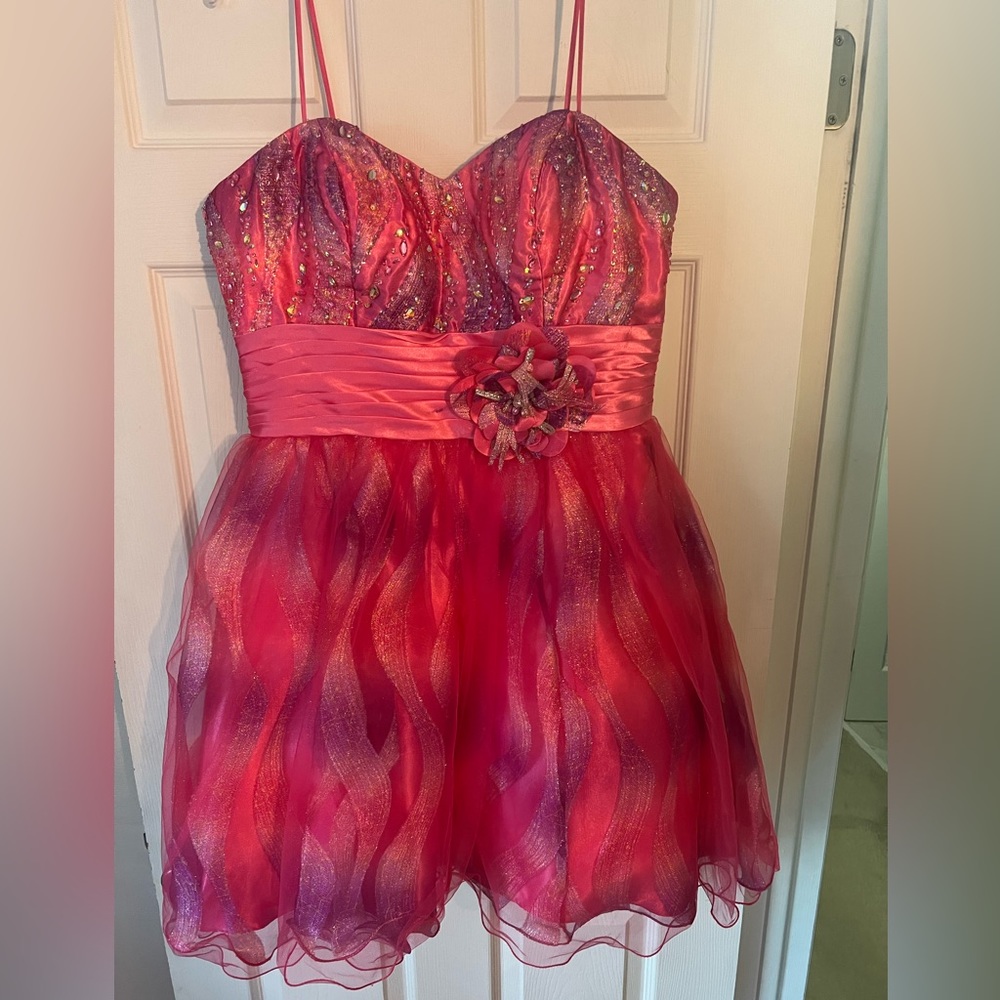 Size 16, pink, Homecoming Dress only worn once! In new condition.